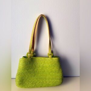 Stylish Straw Green Woven Double Handles Bag snap closure.